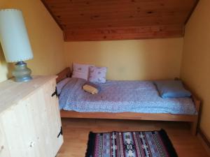 Postel nebo postele na pokoji v ubytování Vikendica kraj Dunava Oaza