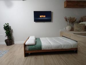 Postel nebo postele na pokoji v ubytování Estudio jacuzzi Luz de Jerez
