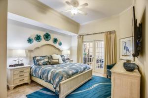 a bedroom with a king sized bed and a window at The Oasis at Orange Beach Unit 3007 (formerly Phoenix West II) in Orange Beach