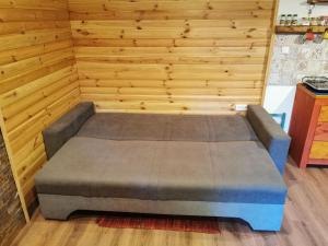 Postel nebo postele na pokoji v ubytování Brvnara kraj Dunava Zelena Oaza