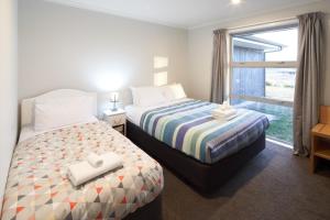 A bed or beds in a room at Majestic View