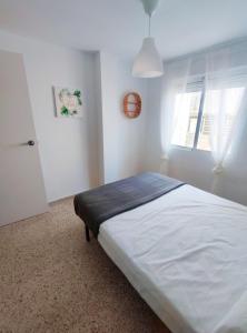 Posteľ alebo postele v izbe v ubytovaní Precioso apartamento en la playa de Bellreguard