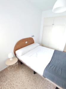 Posteľ alebo postele v izbe v ubytovaní Precioso apartamento en la playa de Bellreguard