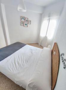 Posteľ alebo postele v izbe v ubytovaní Precioso apartamento en la playa de Bellreguard