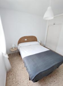 Posteľ alebo postele v izbe v ubytovaní Precioso apartamento en la playa de Bellreguard