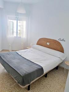 Posteľ alebo postele v izbe v ubytovaní Precioso apartamento en la playa de Bellreguard