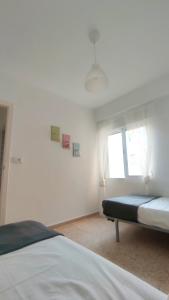 Posteľ alebo postele v izbe v ubytovaní Precioso apartamento en la playa de Bellreguard