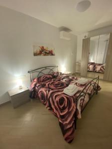 A bed or beds in a room at Fringiulì House