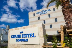 una señal para el gran cañón del hotel en THE GRAND HOTEL GINOWAN en Ginowan