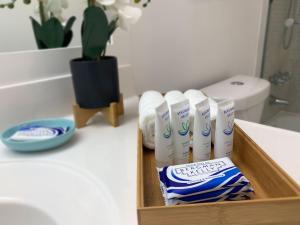 a tray of toilet paper on a bathroom counter at Beach Apartment at Condo-hotel in Miami Beach +10 photos