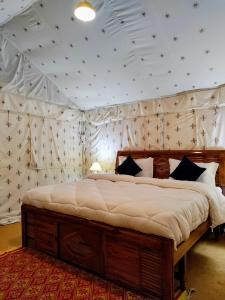 Ένα ή περισσότερα κρεβάτια σε δωμάτιο στο Omya Forest Camps