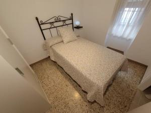 Łóżko lub łóżka w pokoju w obiekcie Casa Villanueva de Córdoba