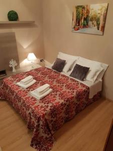 Postel nebo postele na pokoji v ubytování B&B A Modo Mio