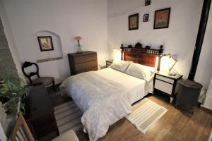 Łóżko lub łóżka w pokoju w obiekcie La Guarida de Vejer Casa Rural