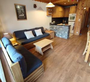 Kuchyň nebo kuchyňský kout v ubytování Appartement au lac ski aux pieds