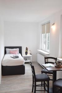 Postel nebo postele na pokoji v ubytování Hotel Rosenhof Braunlage