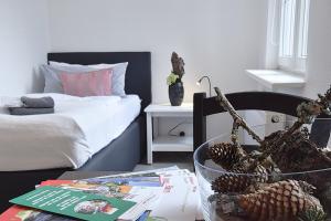 Postel nebo postele na pokoji v ubytování Hotel Rosenhof Braunlage