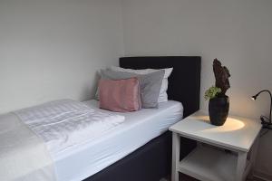 Postel nebo postele na pokoji v ubytování Hotel Rosenhof Braunlage