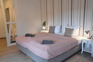 Postel nebo postele na pokoji v ubytování Hotel Rosenhof Braunlage