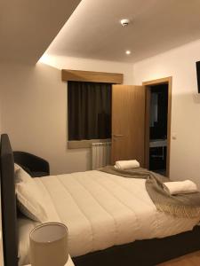 Кровать или кровати в номере Alojamento de montanha