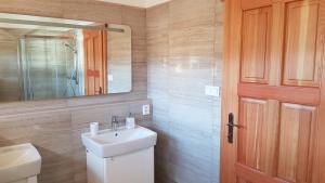 Łazienka w obiekcie Apartmány Plešivec