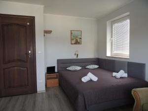 En eller flere senge i et værelse på Europa Spa + 44 billeder