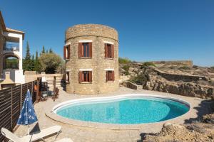 Bazén v ubytování Armonia Seaside Villas nebo v jeho okolí