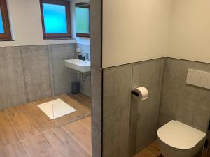Koupelna v ubytování Appartments Zirbennest