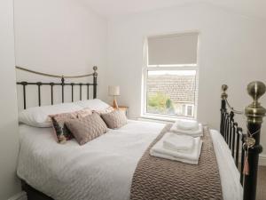 Postel nebo postele na pokoji v ubytování Hornsea Terrace