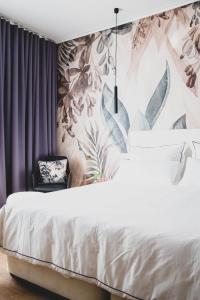 Voodi või voodid majutusasutuse The Kepos Hotel Erlangen toas