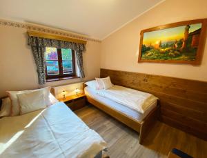 Ліжко або ліжка в номері Hotel Na Dolině