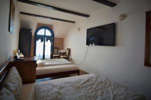 Postel nebo postele na pokoji v ubytování Gala - Guesthouse