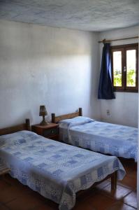 Postel nebo postele na pokoji v ubytování La Posada