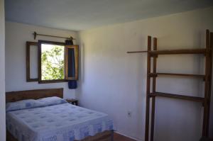 Postel nebo postele na pokoji v ubytování La Posada