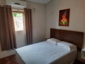 Ein Bett oder Betten in einem Zimmer der Unterkunft Casa para temporada - Chapada das Mesas