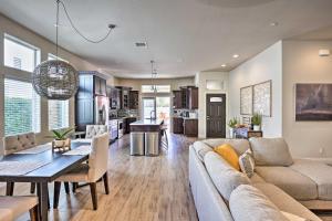 a living room with a couch and a table at Lavish 3 BR La Quinta Oasis Less Than 2 Mi to Old Town in La Quinta