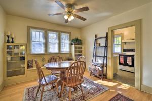a dining room with a table and chairs and a ceiling fan at Charming Montana Home with Grill 6 Mi to Lake Elmo! in Billings