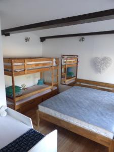 Postel nebo postele na pokoji v ubytování Apartmán u potoka