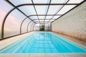 Bazén v ubytovaní La Ren Lecrés Apartamento piscina jardin alebo v jeho blízkosti
