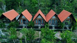 an aerial view of a house with red roofs at Bukit keker cottage in Nusa Penida