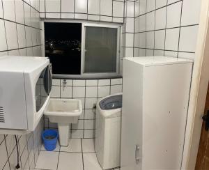 Foto de la galería de Apartamento Guarapari pé na areia com Wi-Fi e Garagem en Guarapari