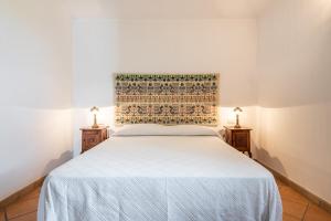 Postel nebo postele na pokoji v ubytování Villa Anna Maria