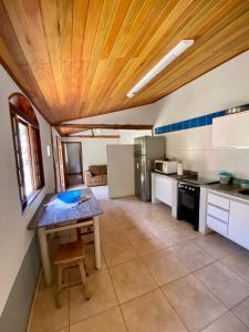 Dapur atau dapur kecil di Casa em Área Rural - Delfinópolis