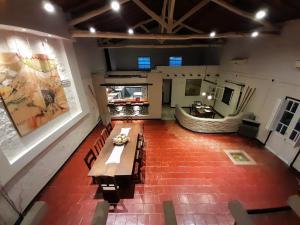 an overhead view of a room with a table and a boat at Casona en Bodega Centenaria in Guaymallen