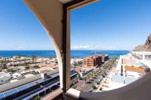 a view of the ocean from a hotel window at Apartment in Palm-Mar - Insel Teneriffa 41647 in Palm-mar