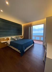 Una cama o camas en una habitación de Suite Sul Mare