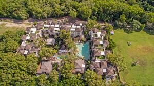 an aerial view of a house with a pool at Swim Out Apartments in Triton Street Beachfront Resort Palm Cove in Palm Cove