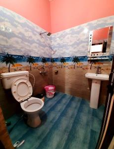 Vonios kambarys apgyvendinimo įstaigoje Nandini Homestay