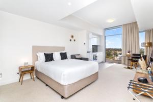 Postel nebo postele na pokoji v ubytování Nautica Residences Fremantle