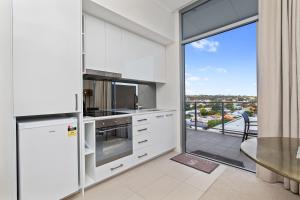 Kuchyň nebo kuchyňský kout v ubytování Nautica Residences Fremantle